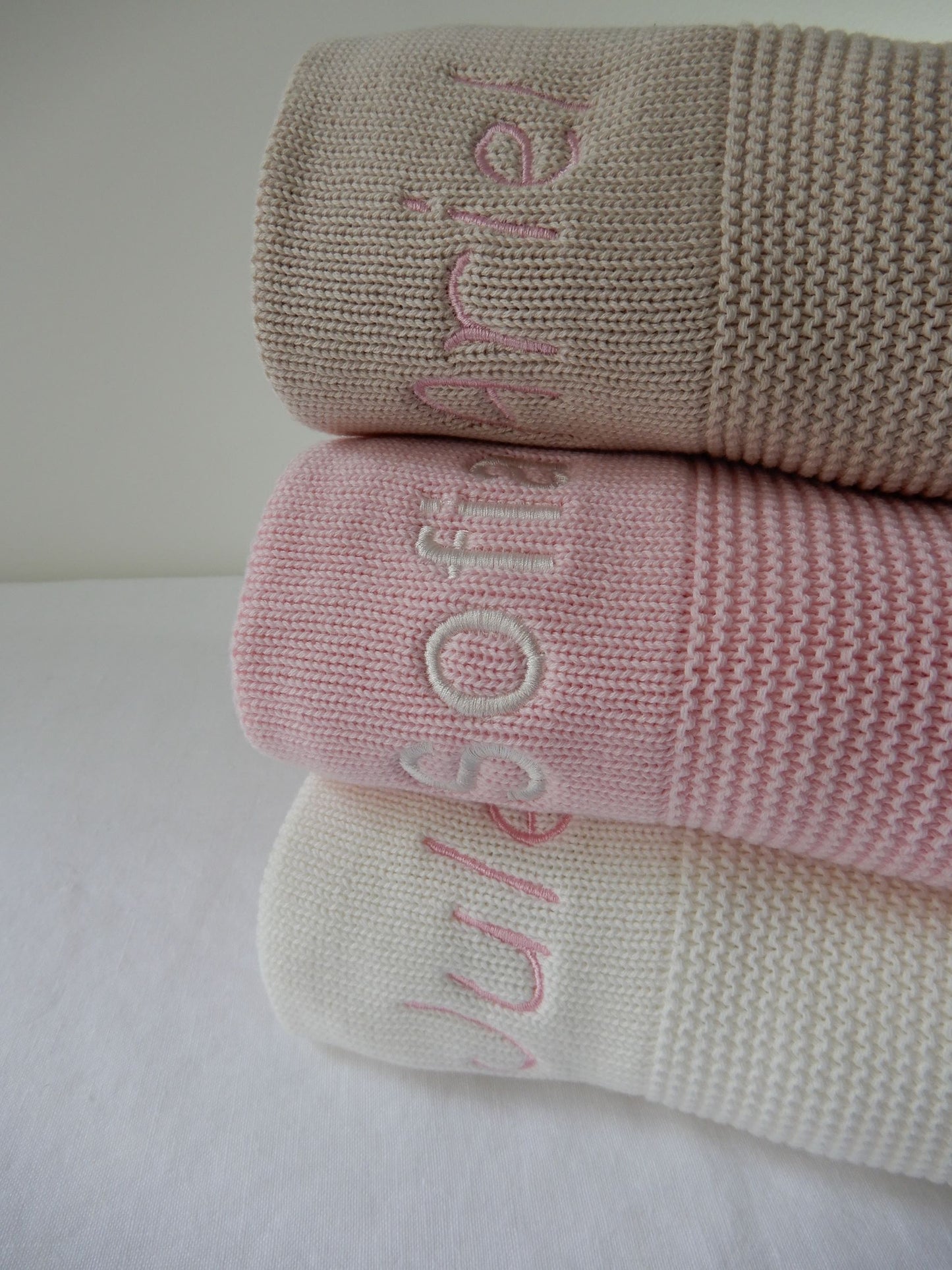 Baby knit blankets with various threads and fonts available 