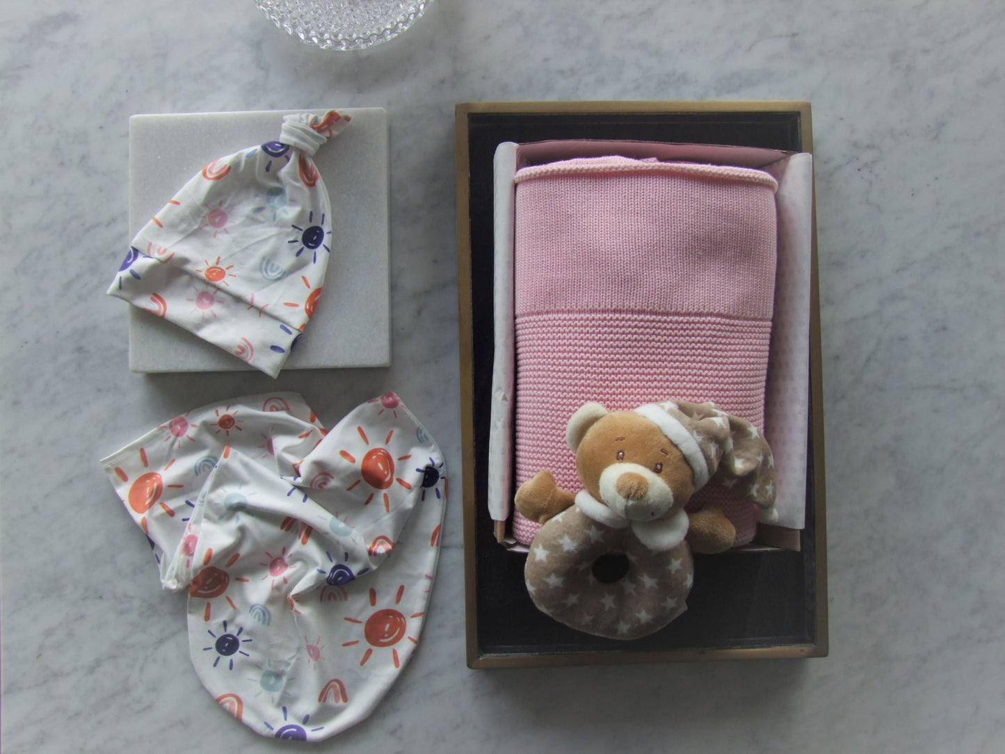 Pink knit baby blanket, can be beautifully personalised with baby name. Matching set knot beanie and baby body sock. This gift box also comes with a cute bear rattle.